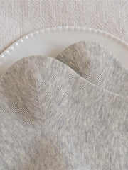 Gray socks showing the ribbed cuff and bear design