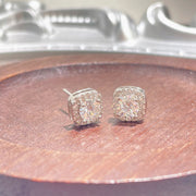 1 carat moissanite stud earrings in 925 sterling silver, close-up view
