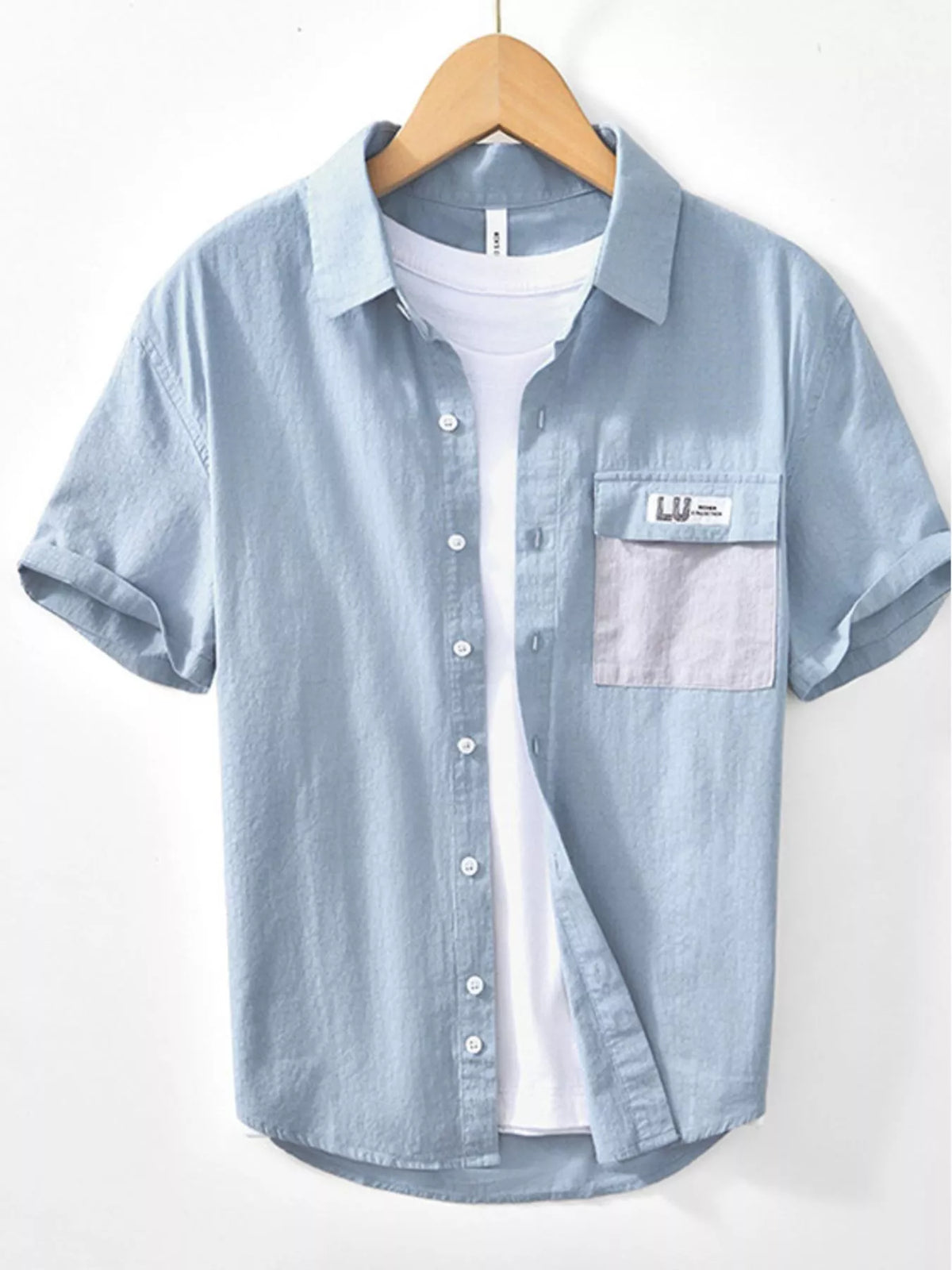 Light blue short-sleeve button-down shirt with chest pocket, front view