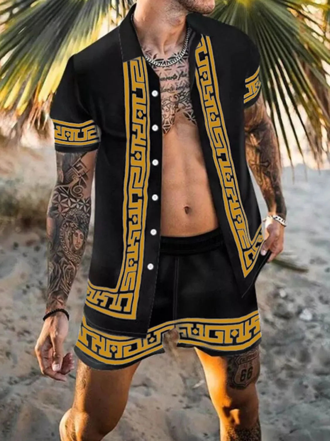 Black short-sleeve shirt and shorts set with gold geometric border print, modeled outdoors.