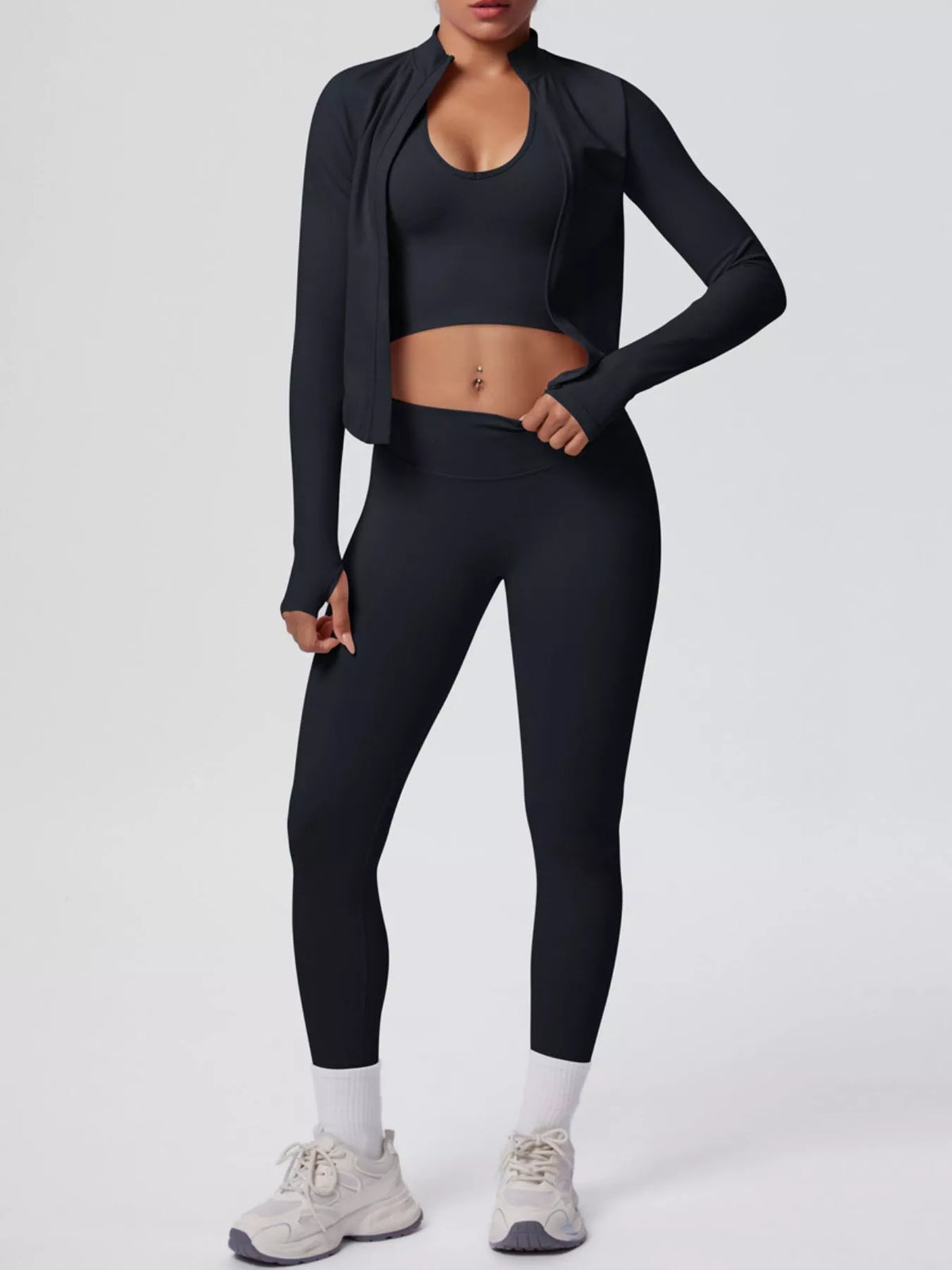 Side view of tank & zip-up jacket and leggings three-piece active set
