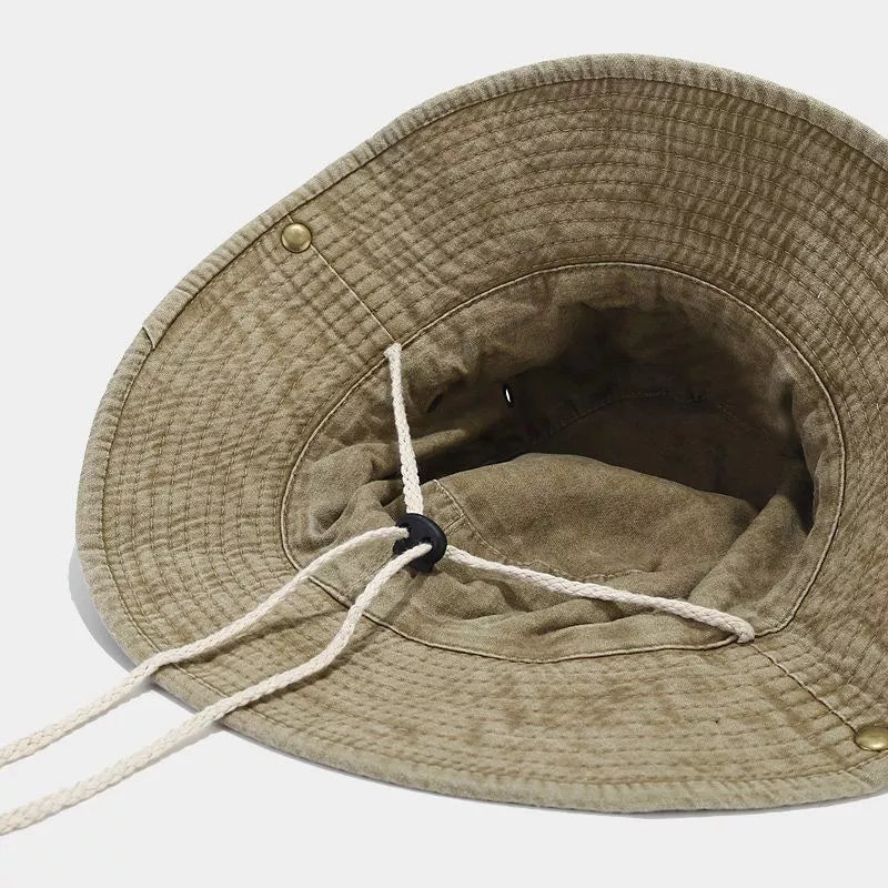 Inside view of deep khaki hat and adjustable chin cord