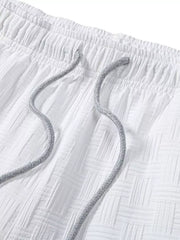 Close-up of white shorts' elastic waistband and drawstring