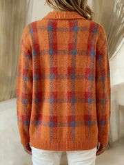 Back view of an orange and rust plaid cardigan with ribbed cuffs and hem.