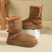 Close-up of gray suede-look boot and buckle straps