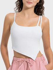 Model wearing peach active cami with angled hem