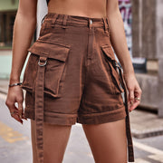 Side view of cream cargo shorts with layered cargo pockets.