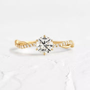 Profile view of the raised round zircon center on the sterling silver ring