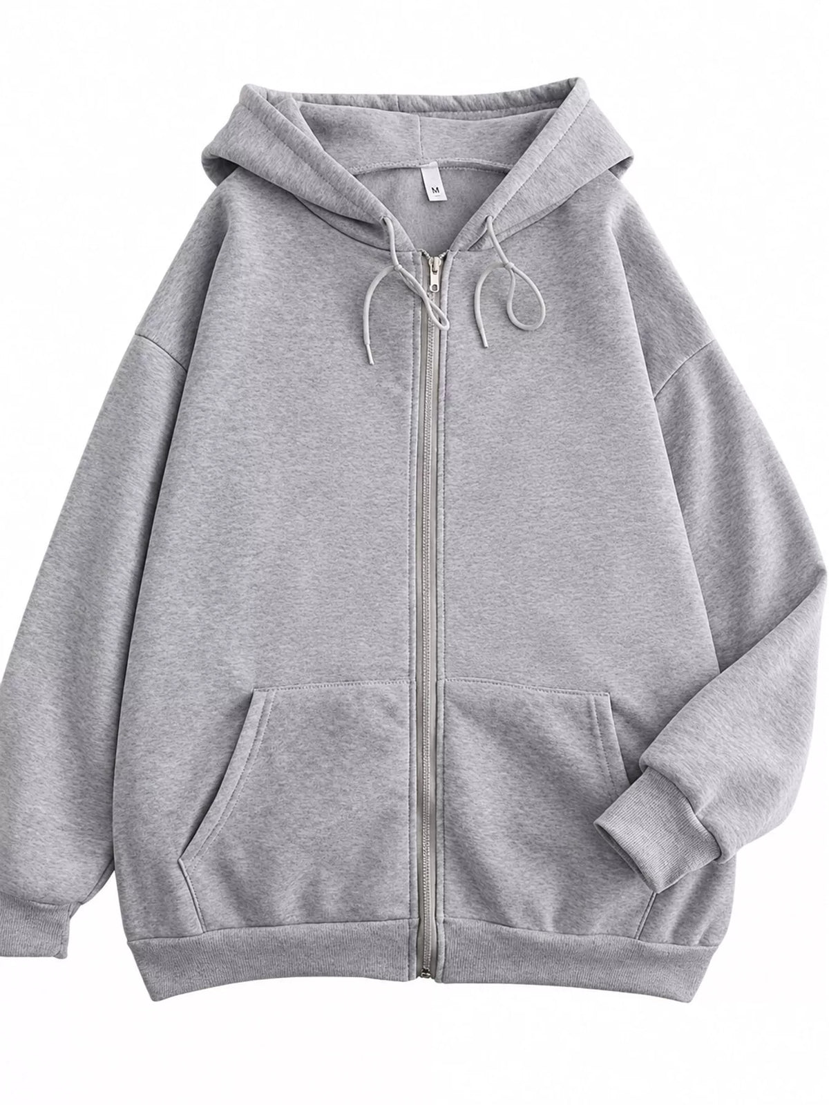 Front view of the gray oversized zip-up hoodie with drawstring hood and pockets