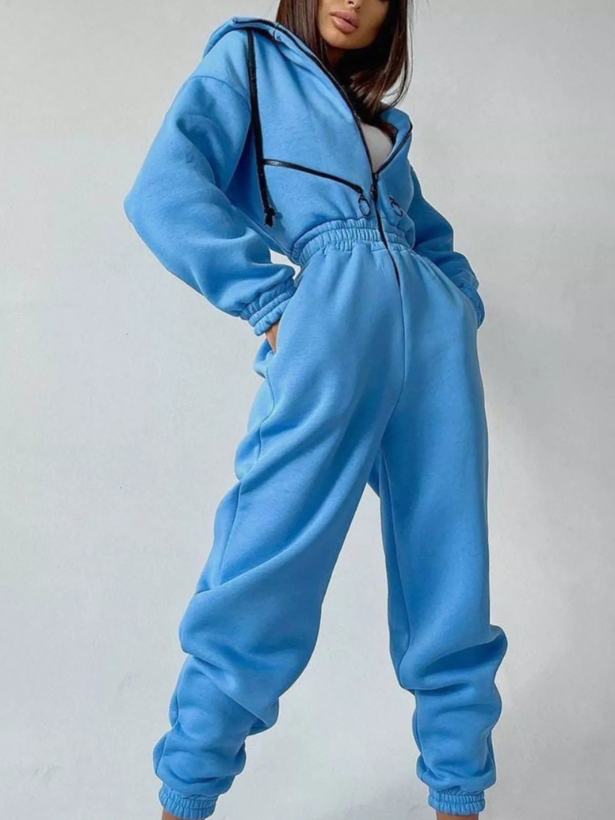 Women's hooded zip-up long-sleeve jumpsuit, blue side view