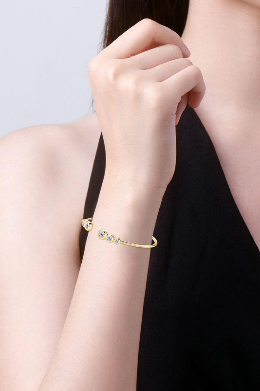 Silver-tone moissanite bracelet with stone accents in a close product view