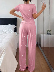 Back view of pink heart-print top and matching pants