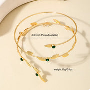 Gold-tone leaf bracelet with size text on pale background