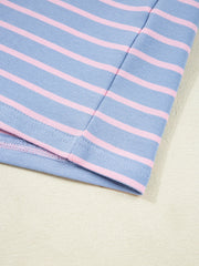 Pink cuff and sleeve seam on striped top
