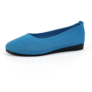 Bright blue mesh flat slip-on in side profile