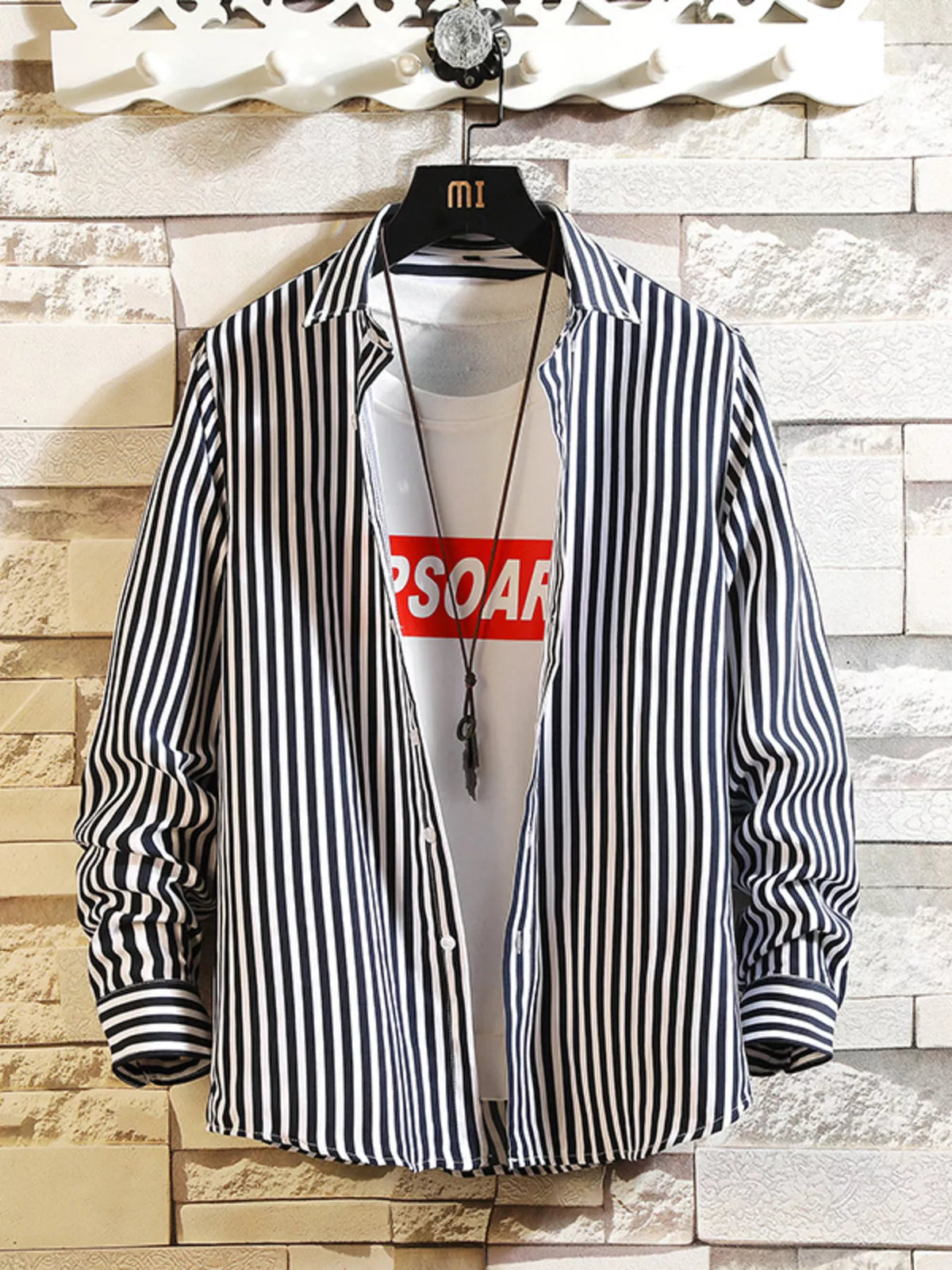 Black-and-white vertically striped button-up shirt, front view
