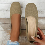 Khaki mesh flats shown from above with one sole visible