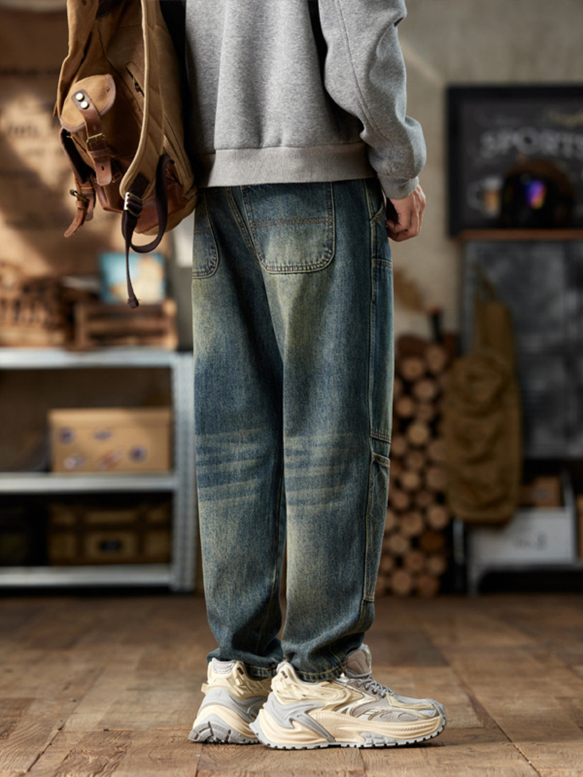 Back view of vintage-wash blue jeans with two patch pockets