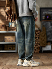 Back view of vintage-wash blue jeans with two patch pockets