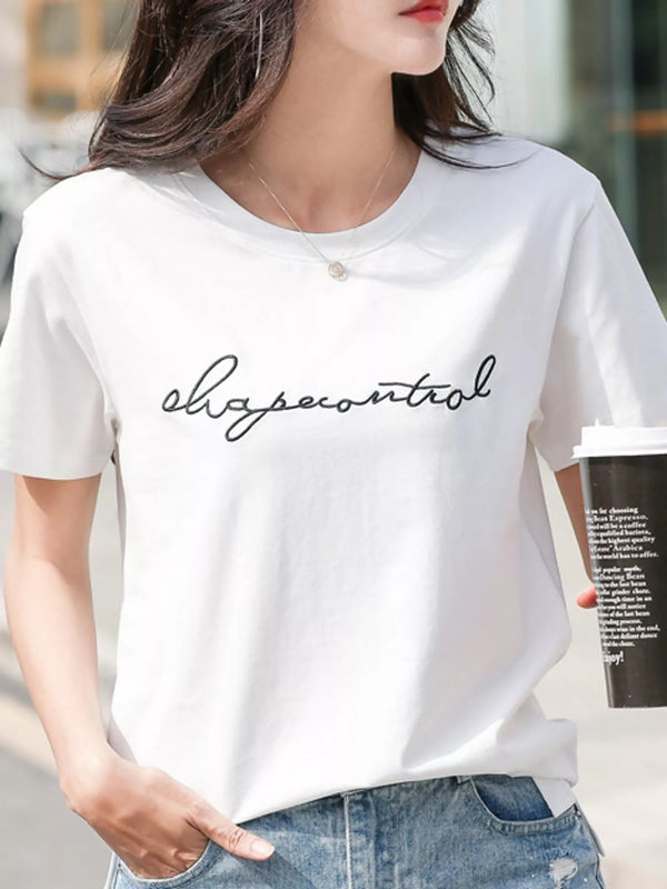 Model wearing a white crew-neck T-shirt with embroidered script lettering
