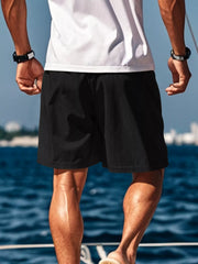 Rear view of black drawstring shorts