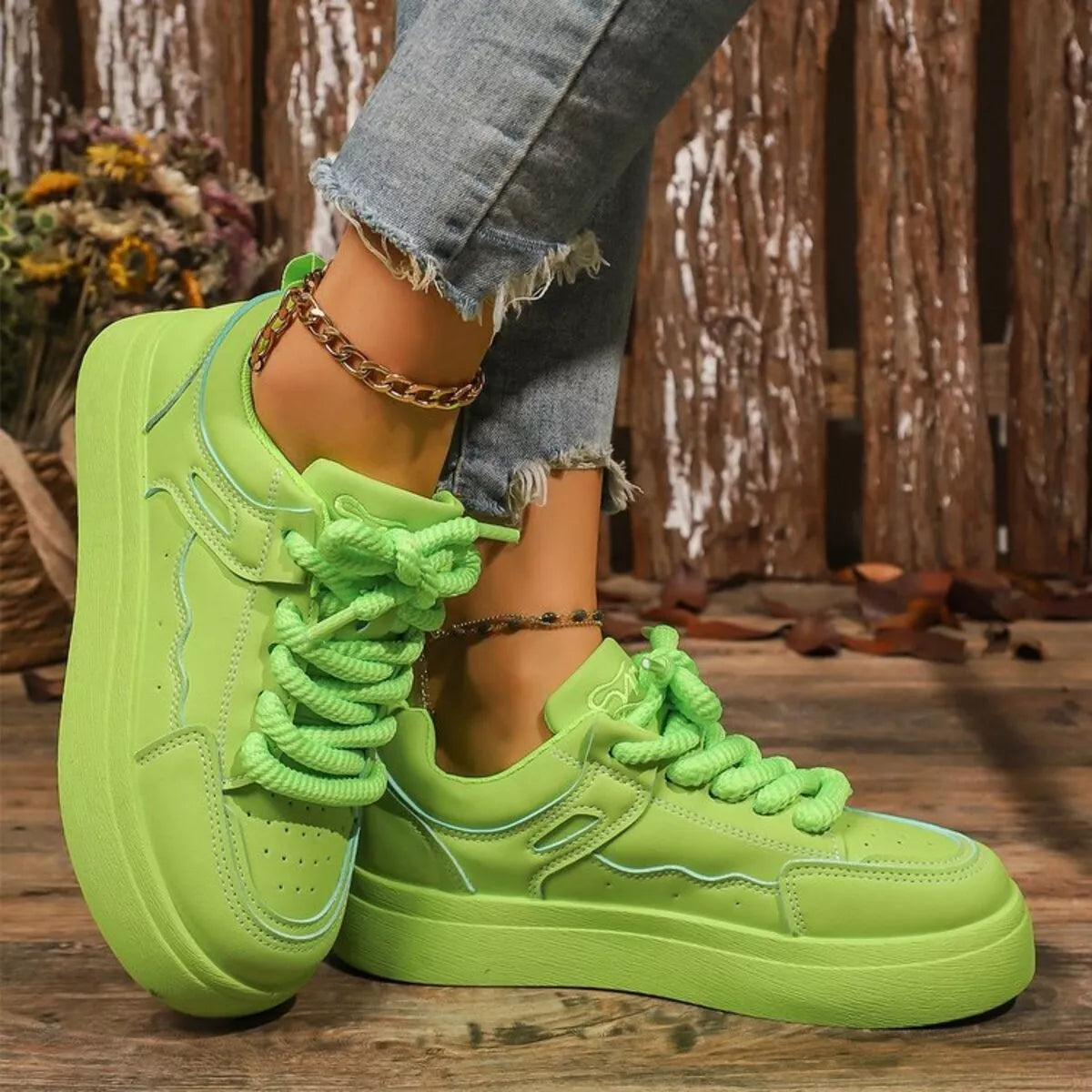 Pair of lime green lace-up platform sneakers