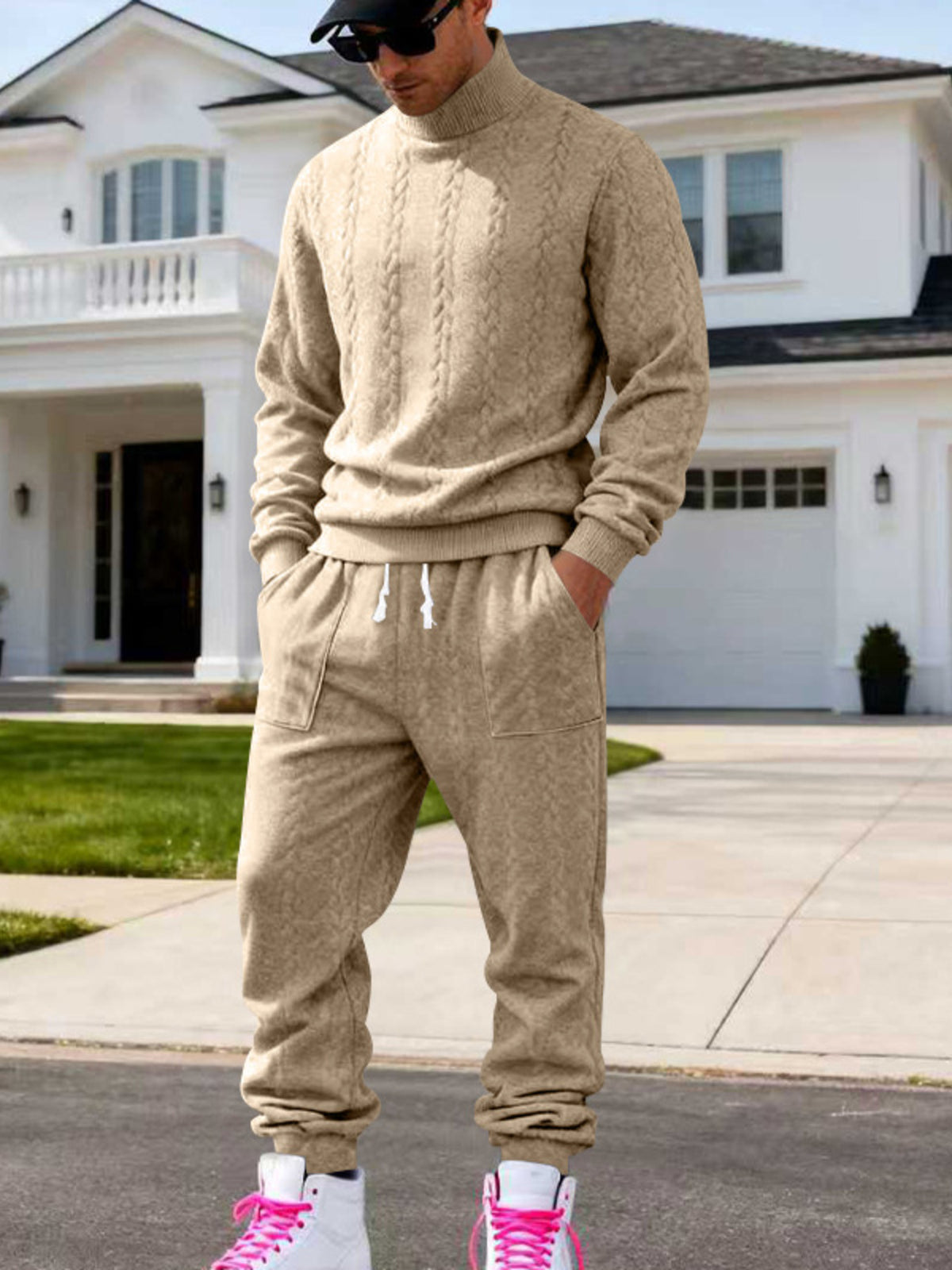 Beige cable-knit sweater and joggers worn front-facing, showing the matching set.