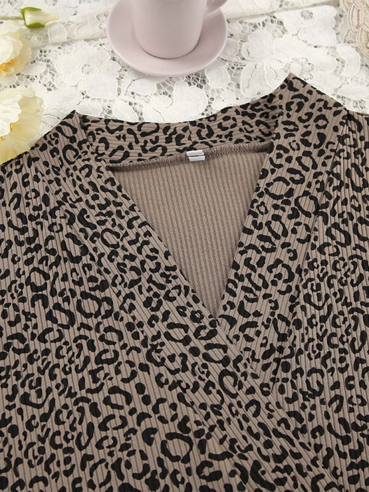 Front view of leopard-print cardigan with matching set