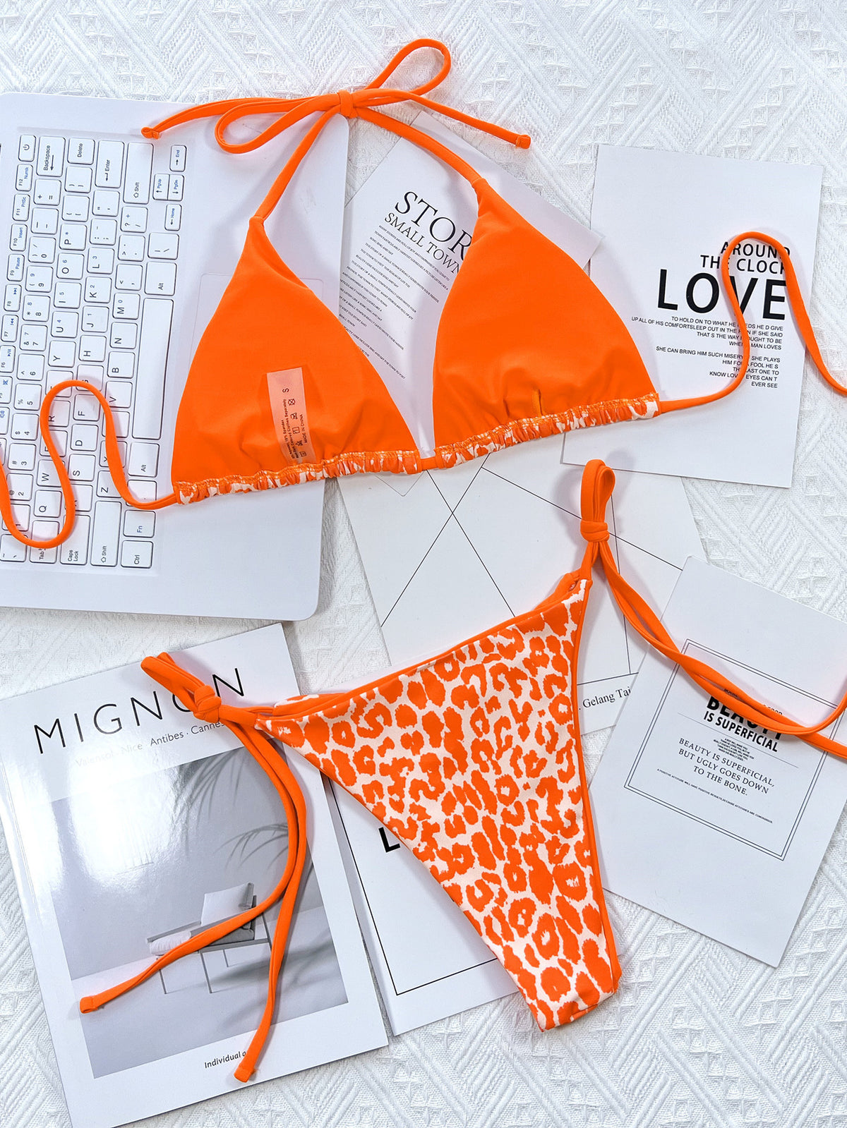 Leopard bikini with pink ties modeled close-up
