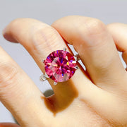 Close-up of pink centre stone ring worn on hand