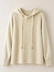 Cream drawstring hooded sweater displayed alone against a pale background.