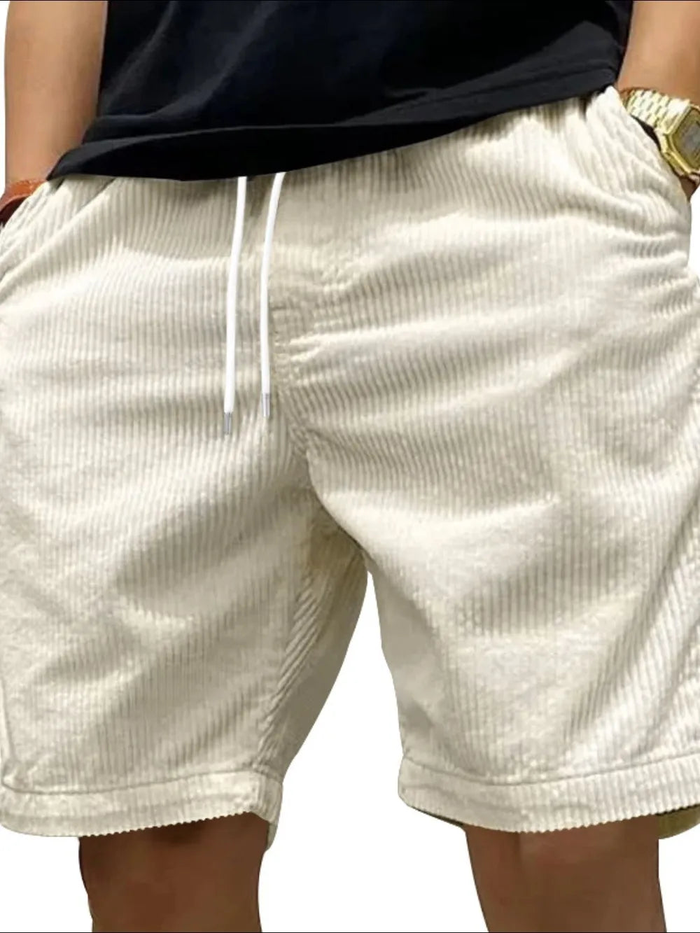 Model wearing white drawstring shorts