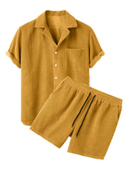 Mustard textured short-sleeve collared shirt and matching shorts, front view