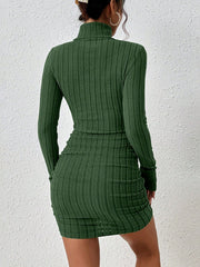 Back view of green dress worn by model