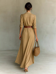 Back view of the camel shirt maxi dress with a brown waist belt.
