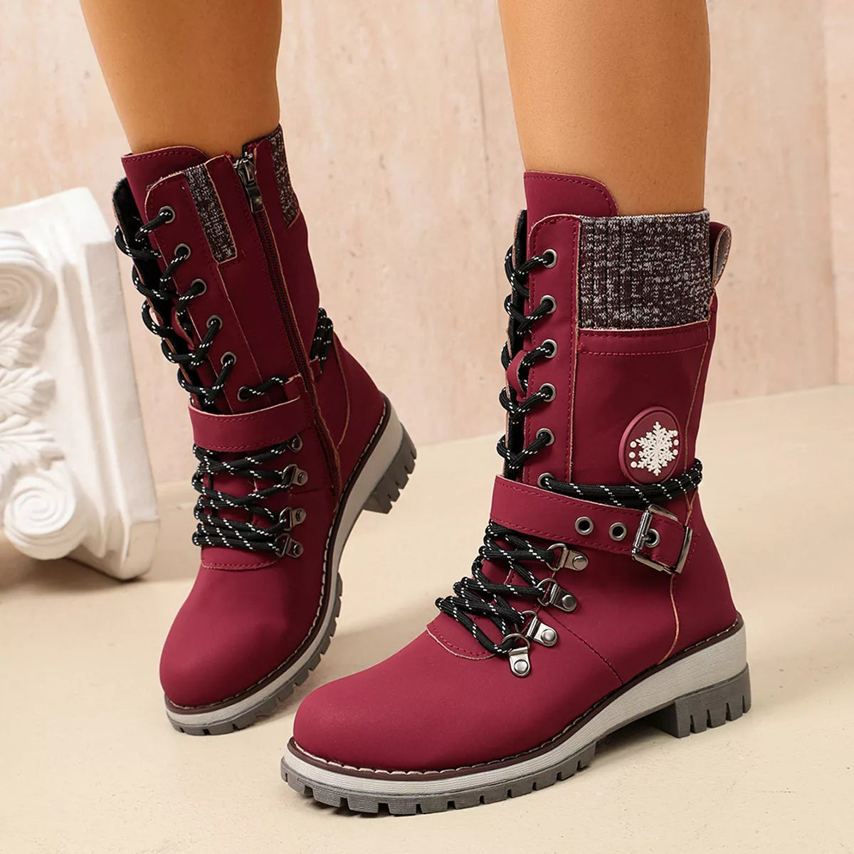 Burgundy lace-up ankle boots with buckle straps