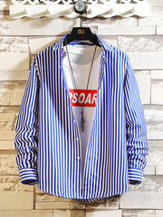 Blue-and-white vertically striped button-up shirt, front view