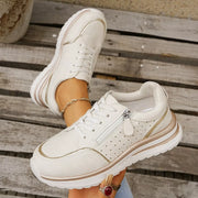 White sneakers viewed from above