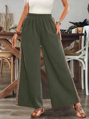 Olive green wide-leg pants with side embroidery
