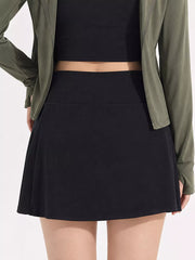 Black high-waisted pleated active skirt, front view