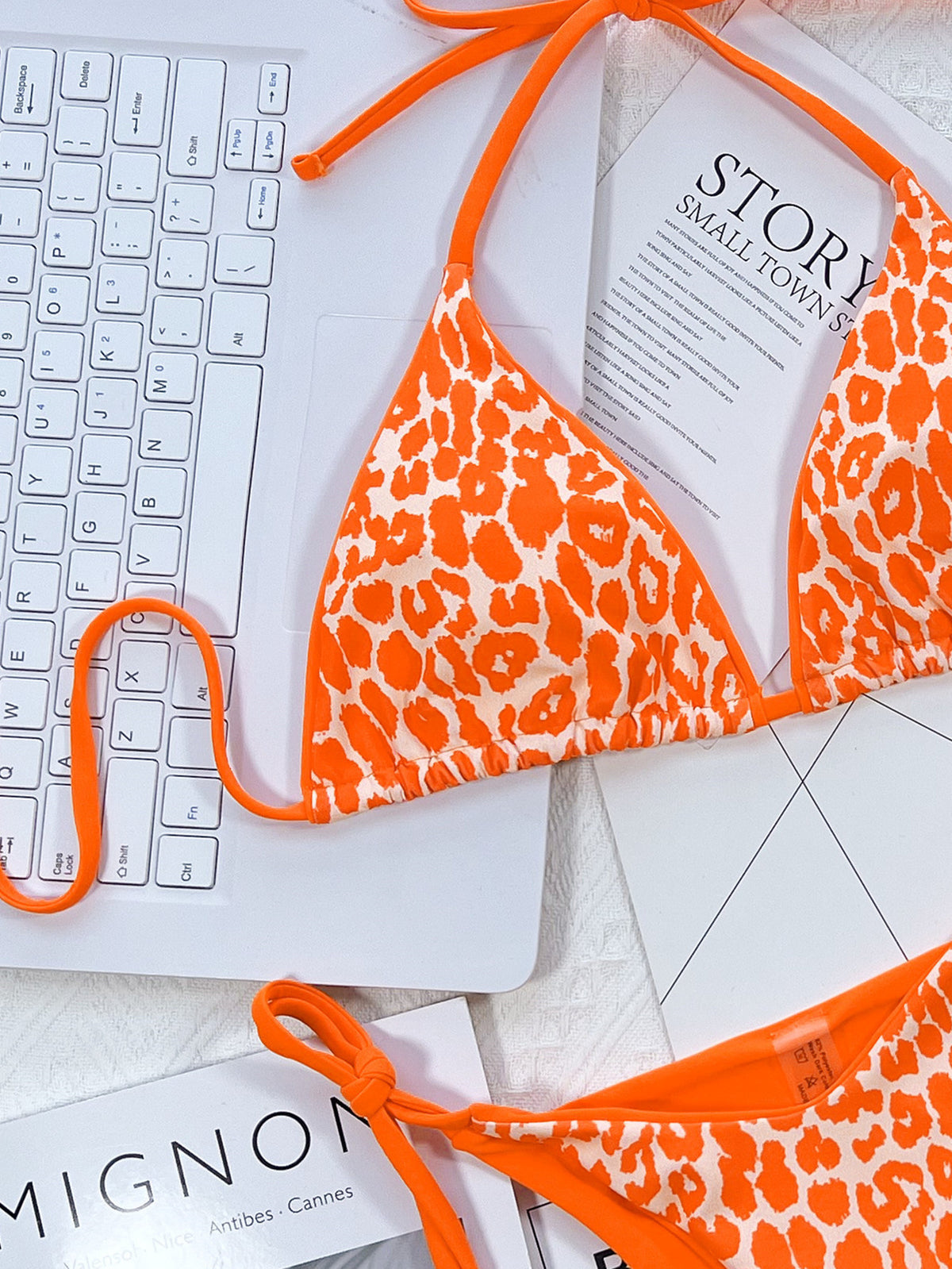 Leopard-print bikini with neon-green side ties