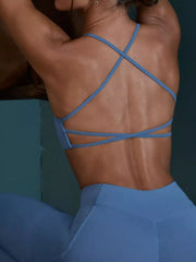 Back view showing fit of seamless cross-waist cami and leggings active set
