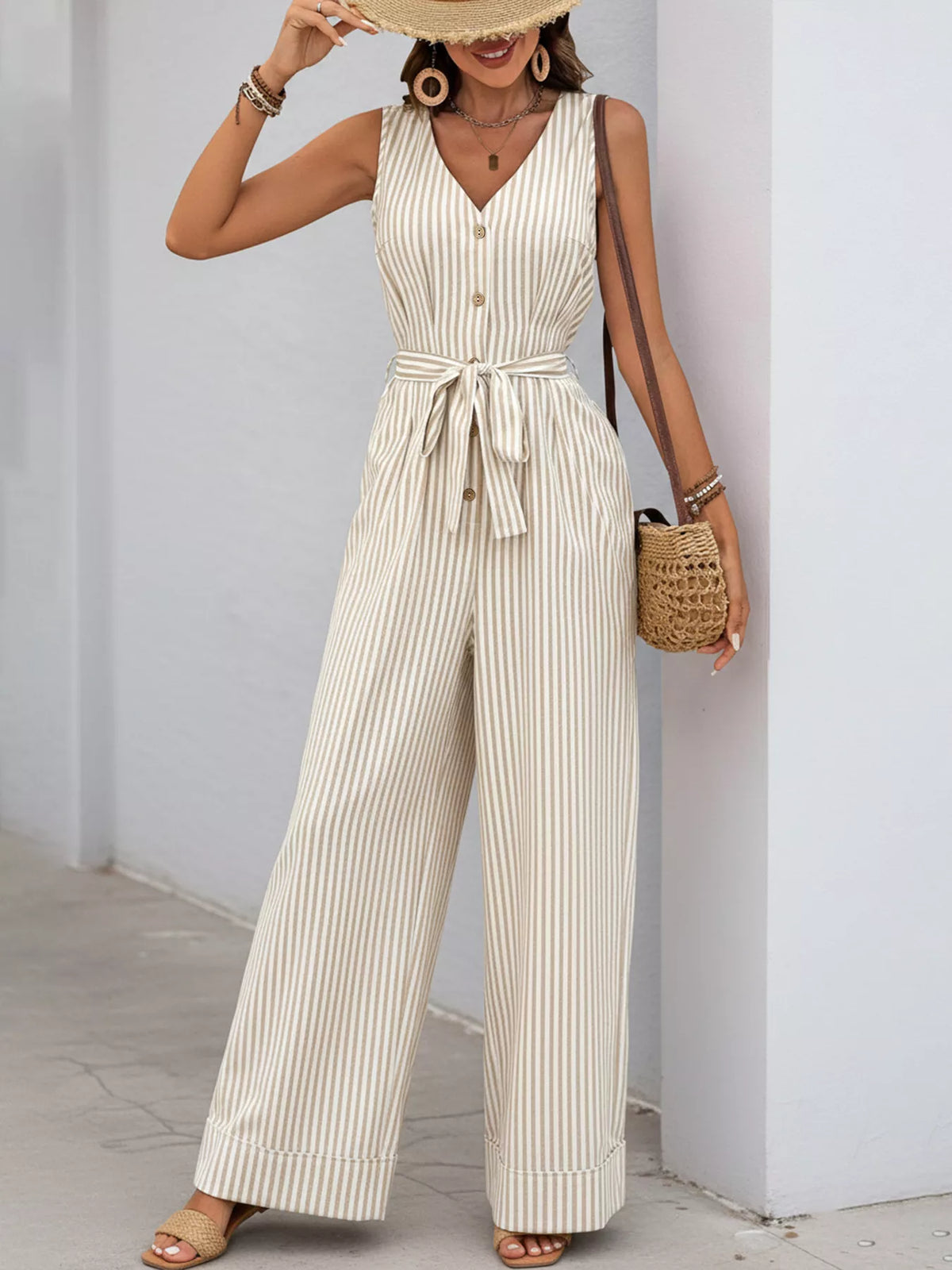 Full-length front view of striped jumpsuit