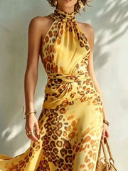 Close view of yellow leopard-print halter bodice and waist tie