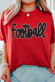 Close view of football lettering on red T-shirt