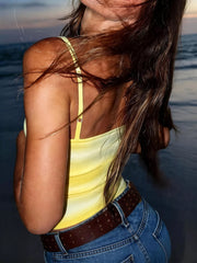 Yellow thin-strap cami rear view with blue jeans