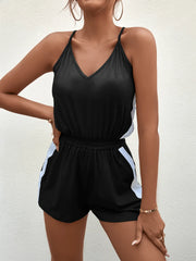 Black V-neck romper shown from the front