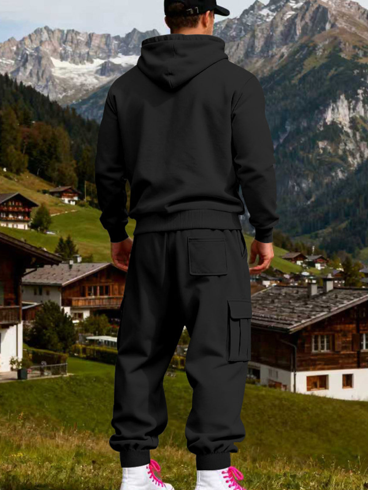 Rear view of black hoodie and matching sweatpants with a back patch pocket