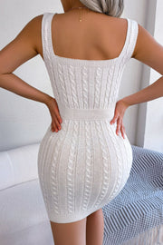 Back view of white mini dress with square back and vertical cable-knit texture.