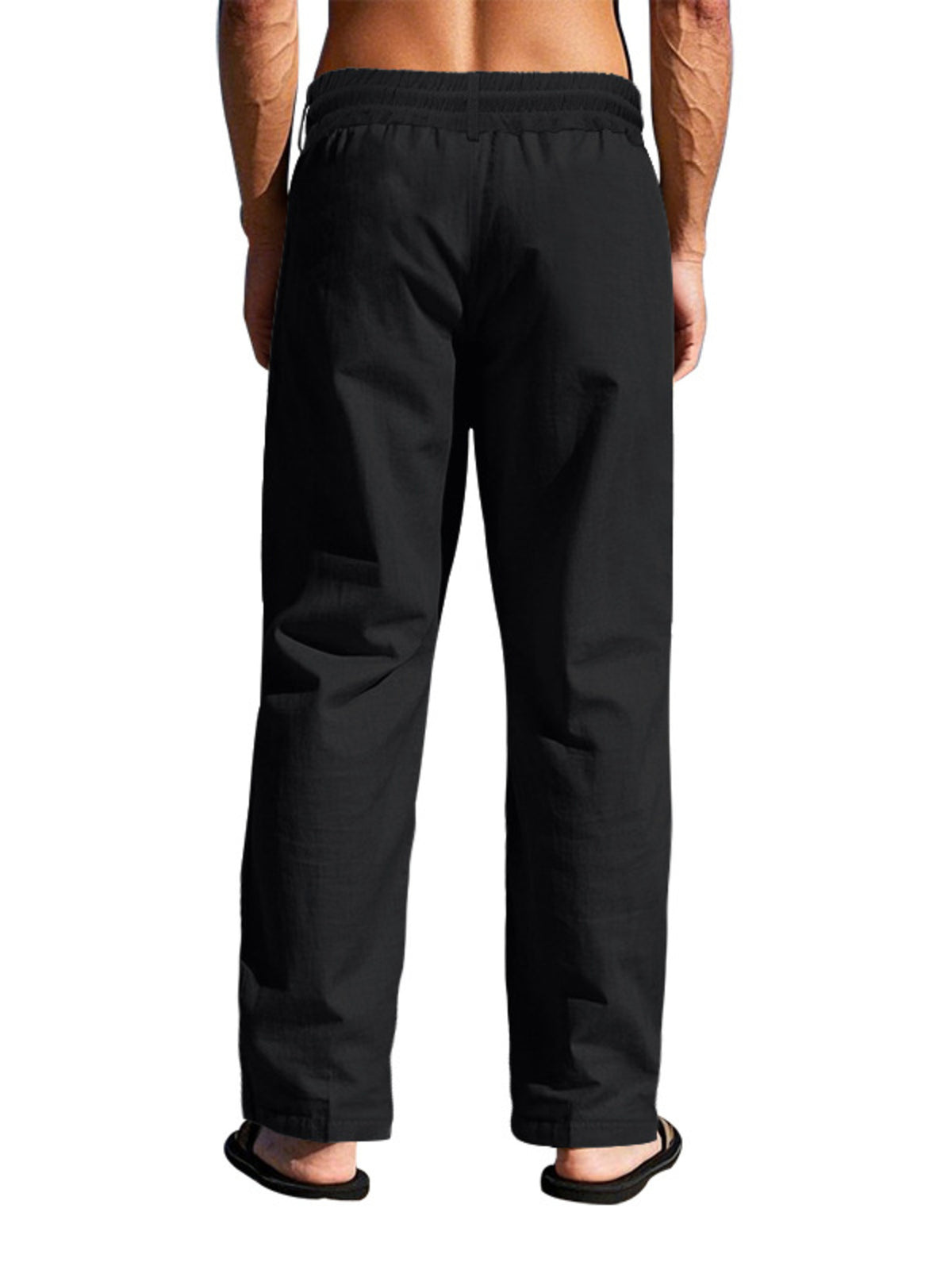 Model wearing black pants from behind